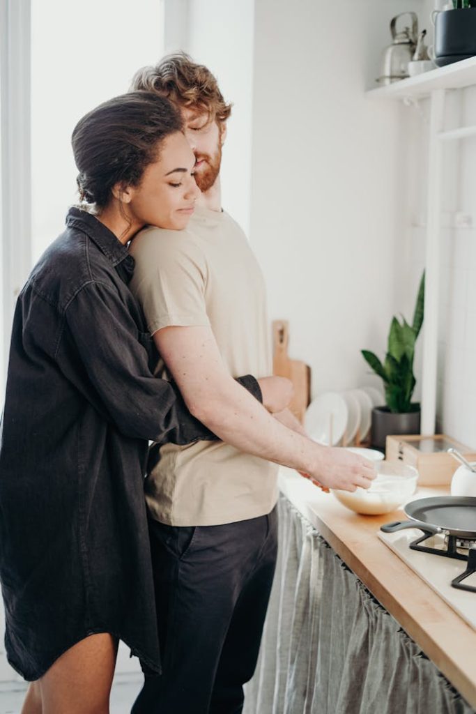 pexels-photo-3692759 Photo of Woman Hugging Her Man